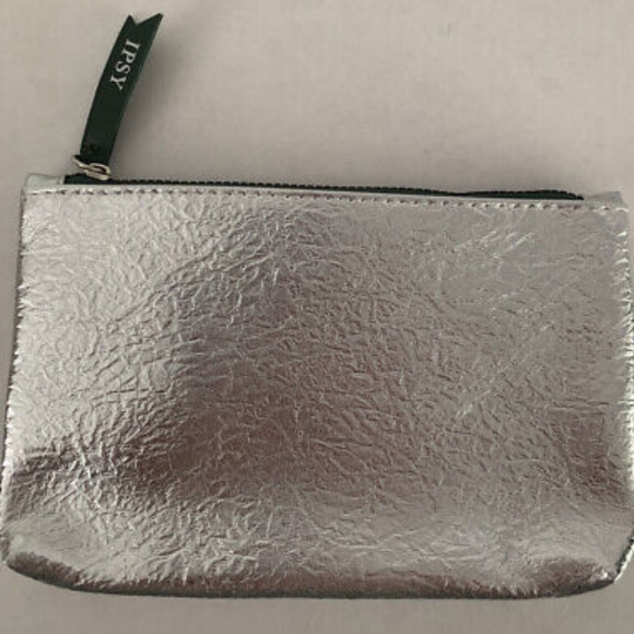 ipsy Handbags - Ipsy Metallic silver shiny cosmetics bag w/ free gift